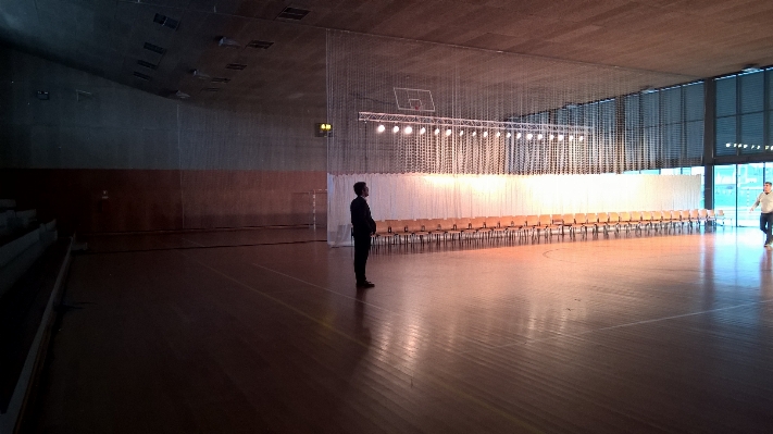 Man light structure auditorium Photo