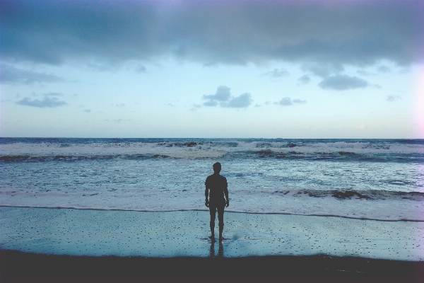 Man beach sea coast Photo