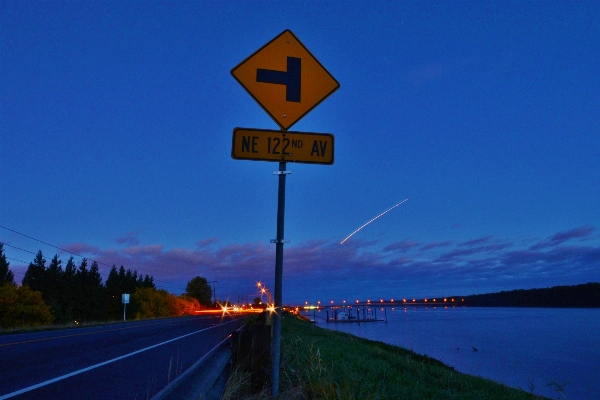 Road dusk sign street light Photo