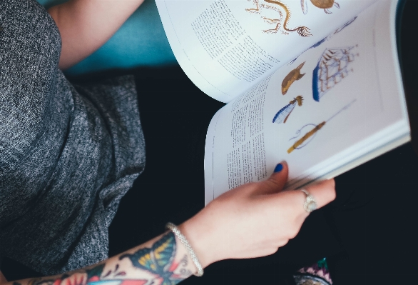 Writing hand book woman Photo