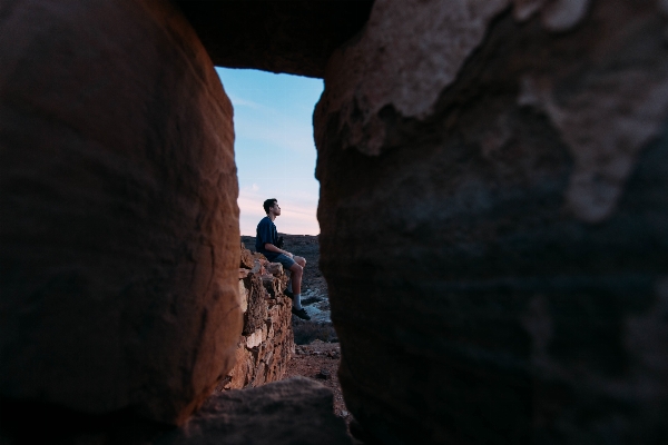 Man rock sunlight formation Photo