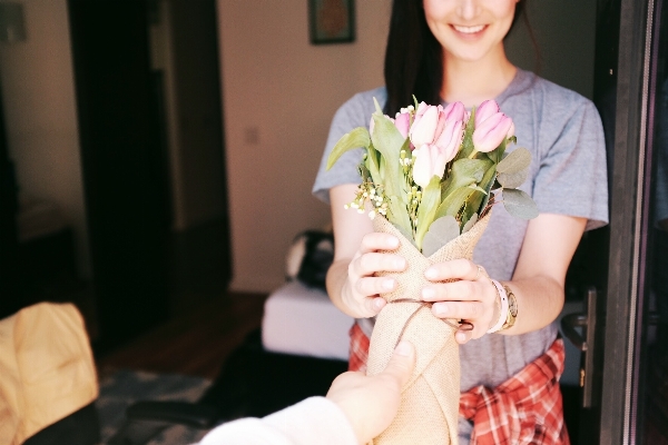 Woman flower tulip bouquet Photo