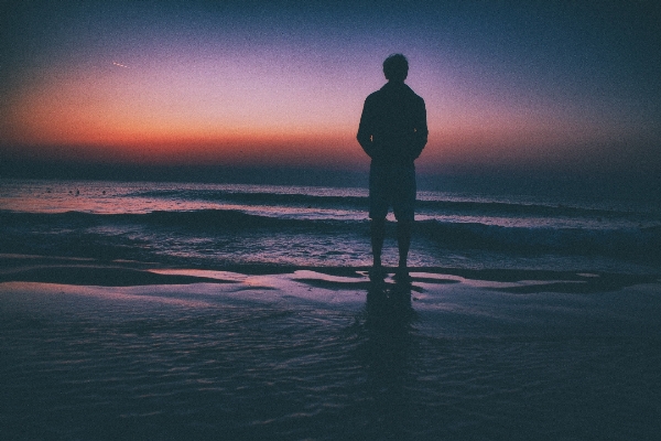 Foto Pria pantai laut pesisir