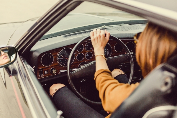 Woman car wheel driving Photo