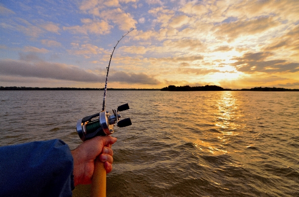 Sea sunset boat recreation Photo