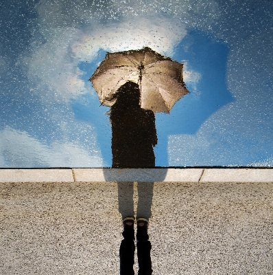 Water silhouette rain umbrella Photo