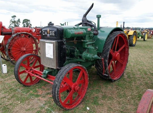 Tractor wheel farming vehicle Photo