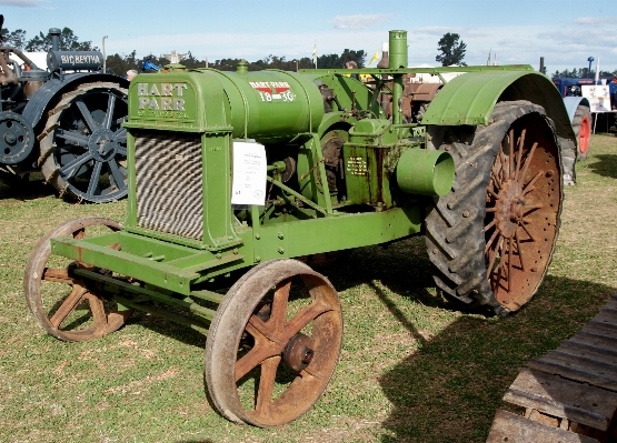 Tractor wheel farming vehicle Photo