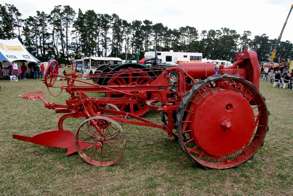 Tractor wheel farming vehicle Photo