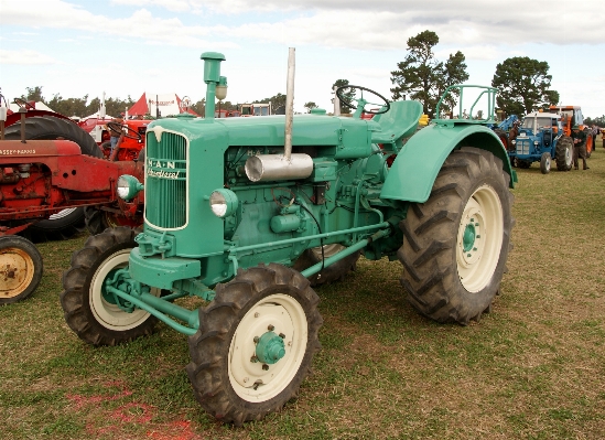 Tractor field wheel farming Photo