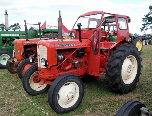 Tractor wheel farming vehicle Photo