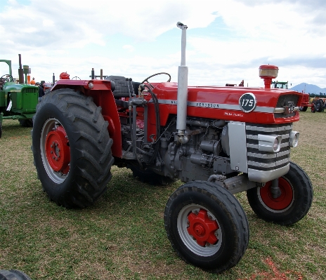 Tractor wheel farming vehicle Photo