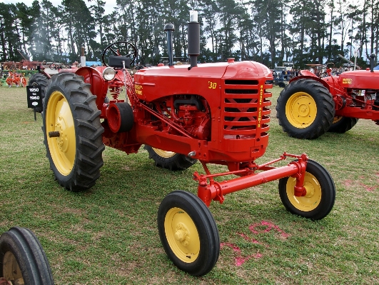 Tractor wheel farming vehicle Photo