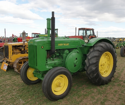 Tractor field farming vehicle Photo