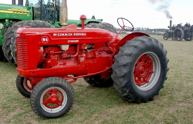 Tractor wheel farming vehicle Photo