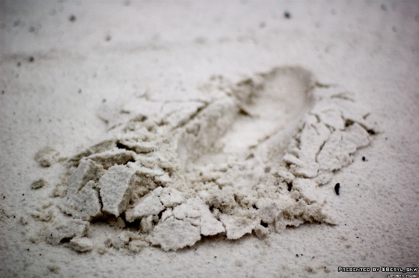 Hand sand cold white Photo