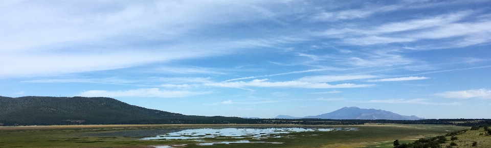 Mar costa horizonte nube