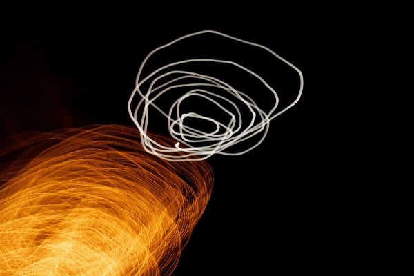 Hand licht spiral- blume Foto