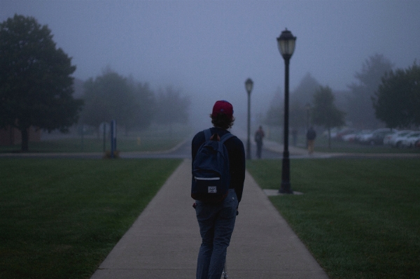 Fog sidewalk backpack walkway Photo