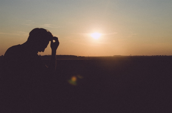 Horizon silhouette person sun Photo