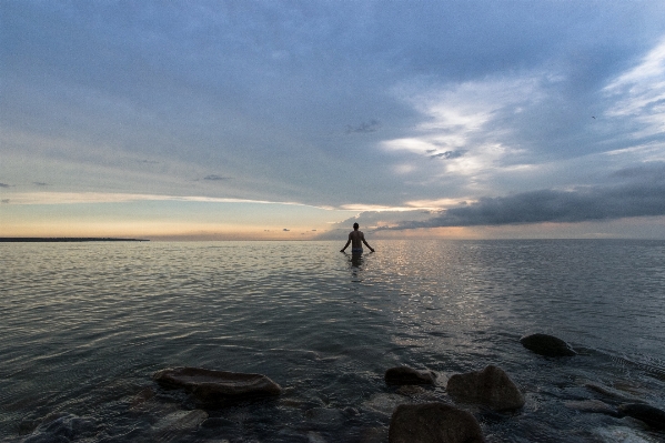 Man beach sea coast Photo