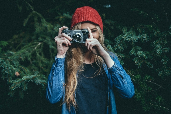 Hand girl hair camera Photo