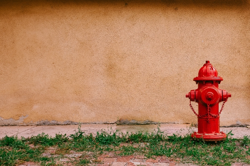 Wall red color fire hydrant