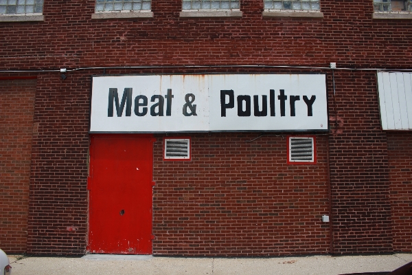 Wall sign red facade Photo