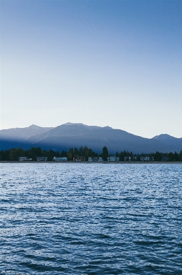 海 水 地平线 山 照片