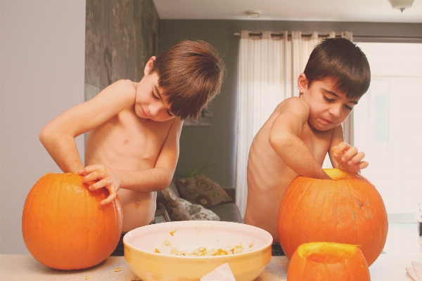 Boy kid produce pumpkin Photo