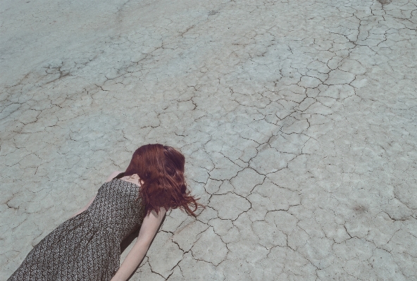 Sand girl woman floor Photo