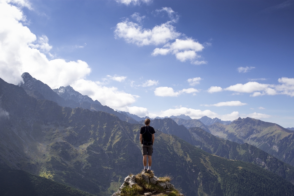 Man walking mountain cloud