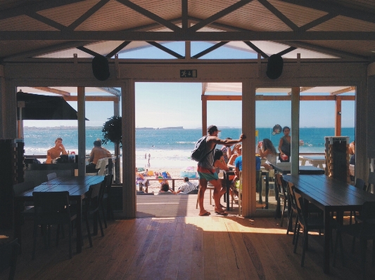 Beach people window restaurant Photo