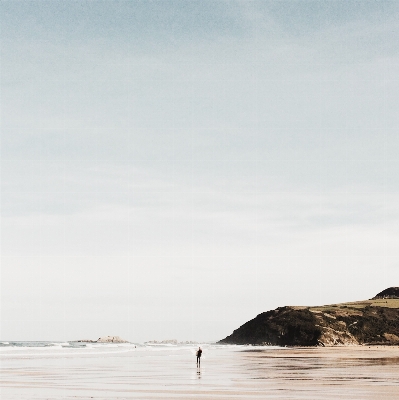 Man beach sea coast Photo