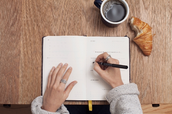 Notebook writing hand person Photo