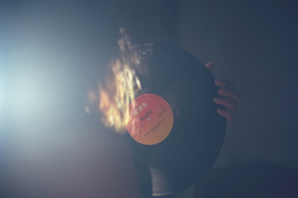 Hand record vinyl light Photo