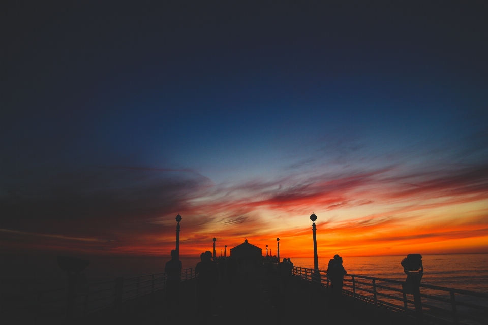 Horizon silhouette cloud people