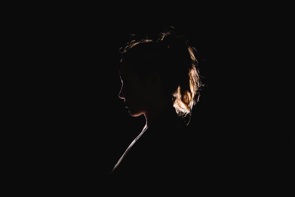 Hand silhouette light woman