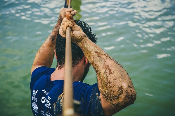 Hand man sea water Photo