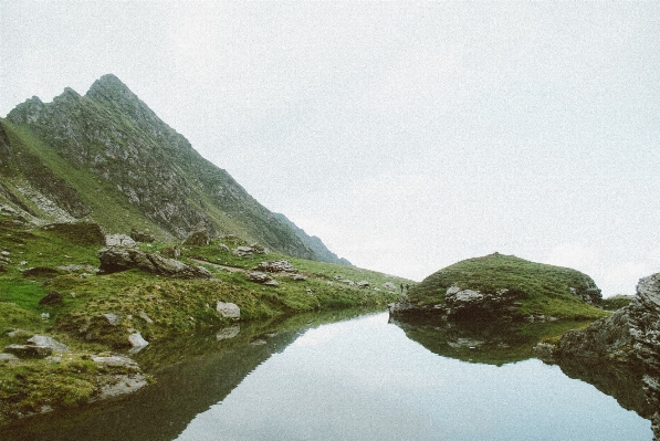 Foto Acqua rock montagna nube