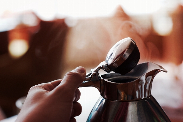 Foto Mano persona caffè fotografia