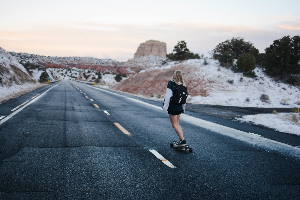 Person woman road skateboard Photo