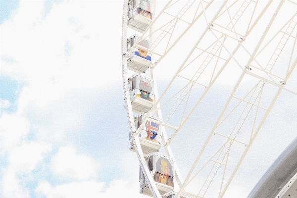 Skyscraper line ferris wheel mast Photo