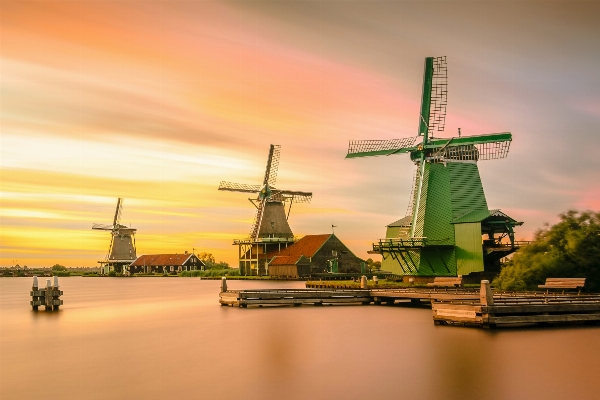 Sea water morning windmill Photo