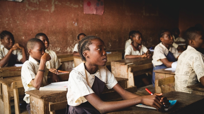 Foto Anak muda afrika murid