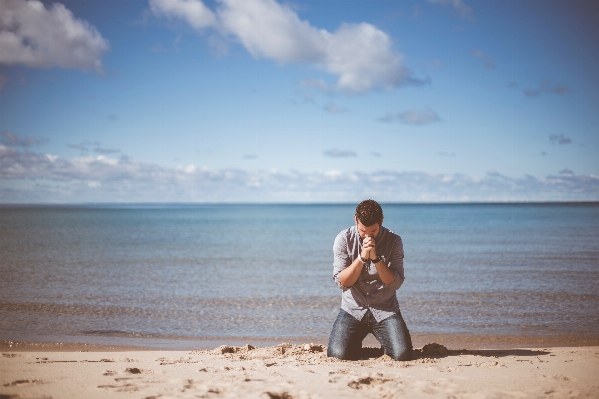 Man beach sea coast Photo