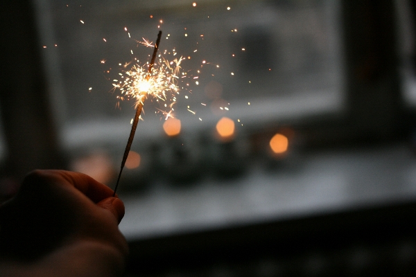 Hand light flower sparkler Photo