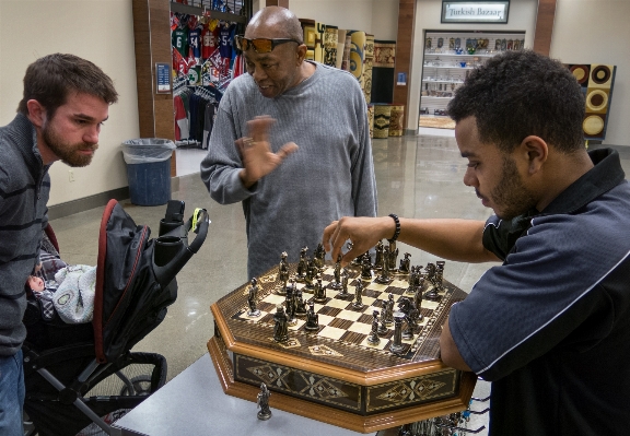 Foto Ricreazione gioco da tavolo
 uomini gli sport