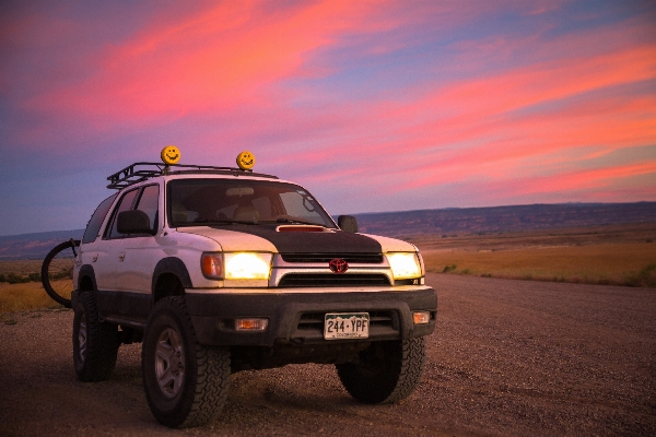 Mountain sunset road car Photo