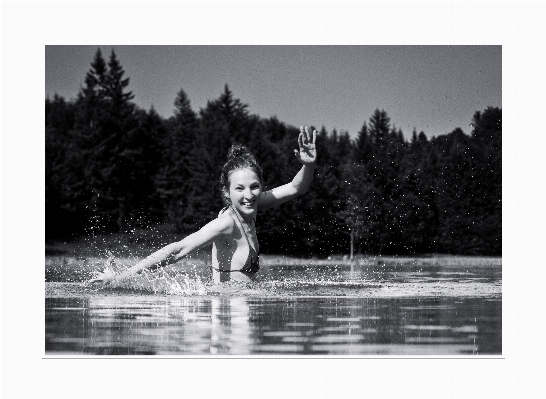 Black and white photography lake jumping Photo